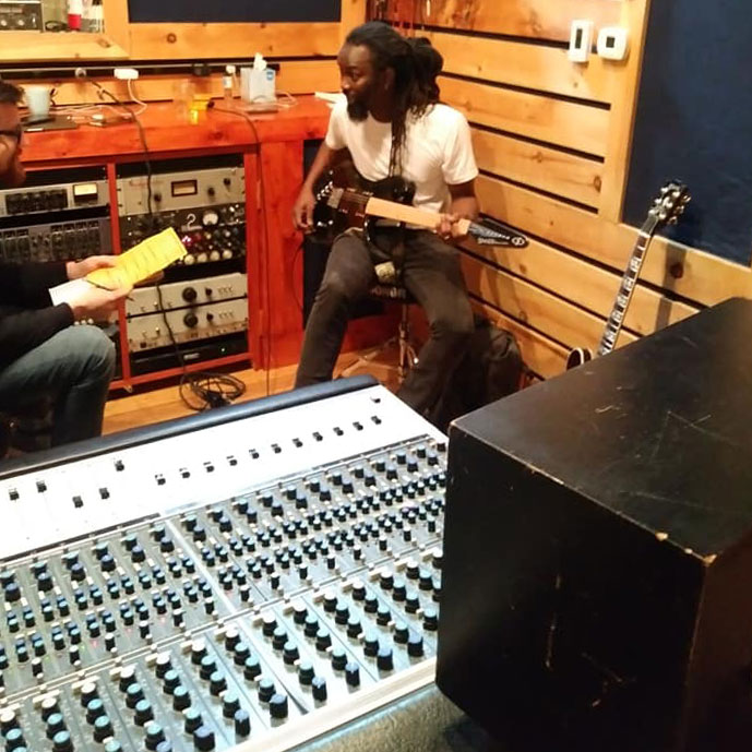 Amadou Gaye with a Gimenez Sinner at the mixing board